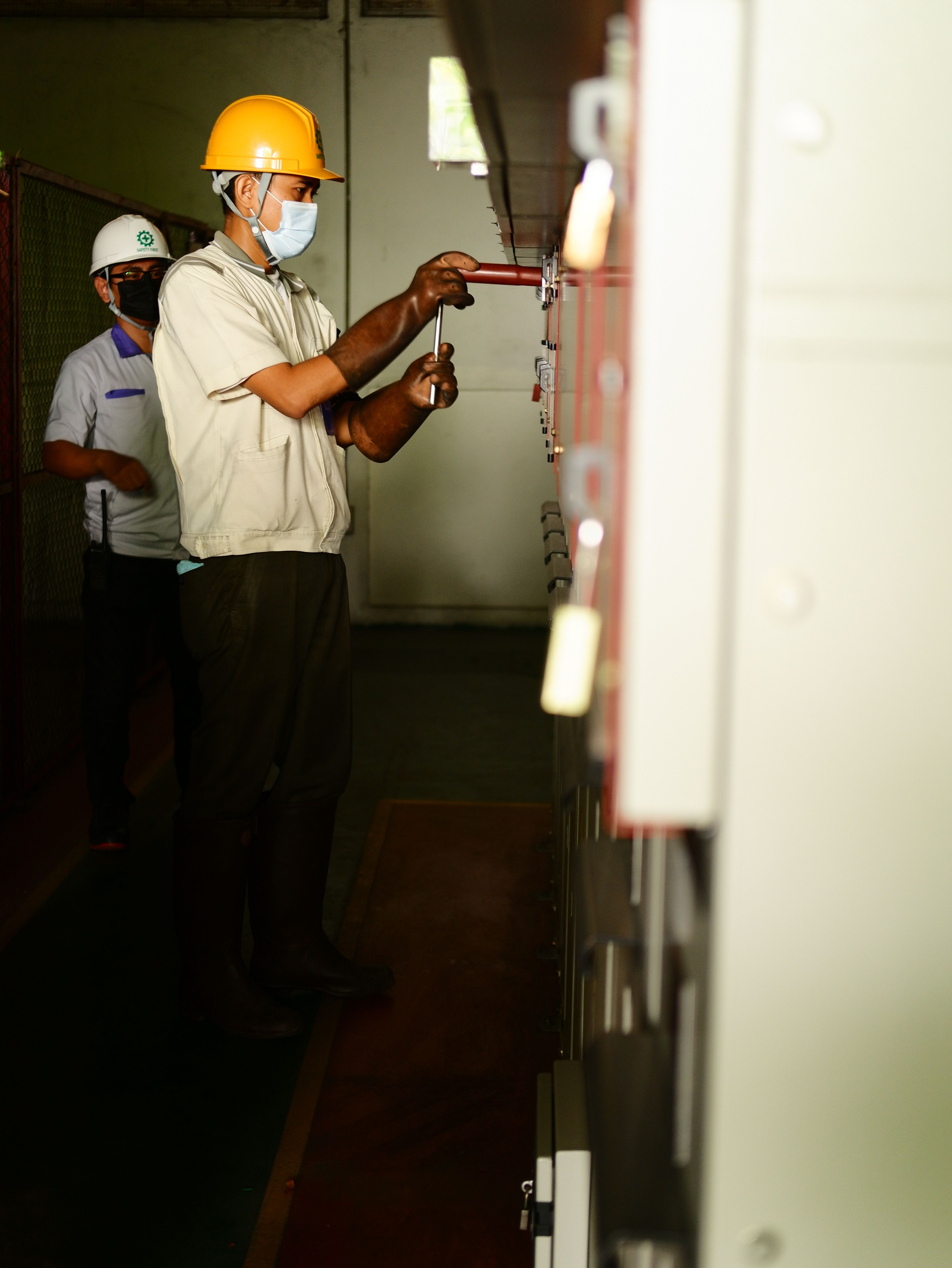 Professional electrician at work in modern setting